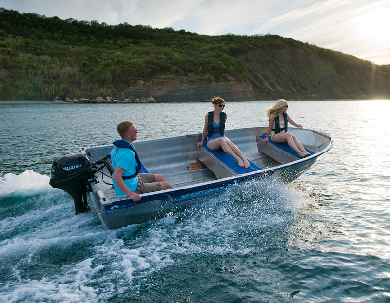 Suzuki 20HP DF20A powering motorboat with people inside